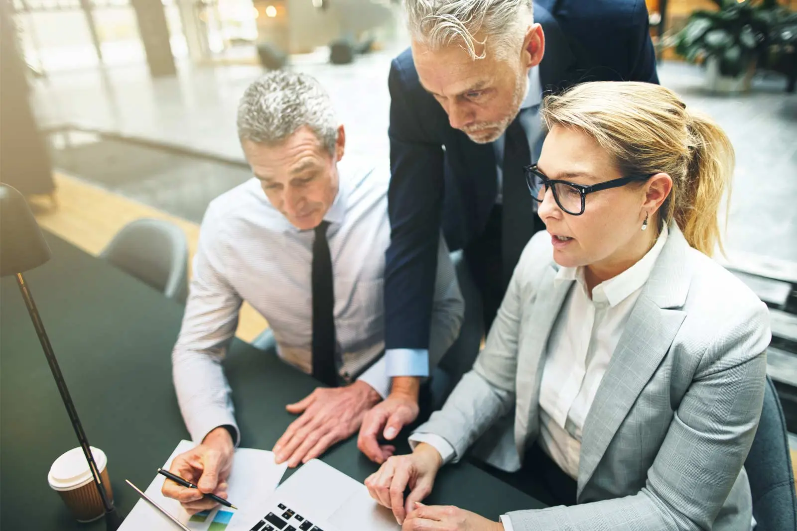 Globally connected technology professionals working across distributed locations, representing HashRoot’s global workforce management services for international teams.